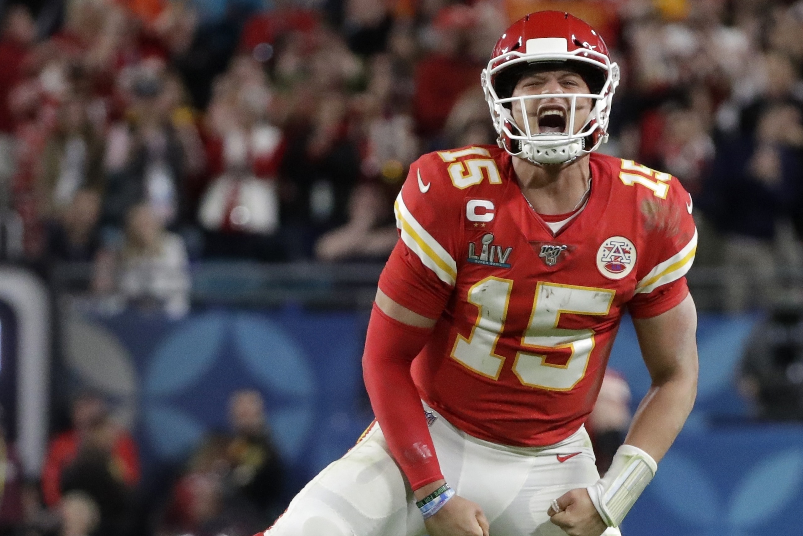 Kansas City Chiefs quarterback Patrick Mahomes (15) celebrates a long pass against the San Francisco 49ers during the second half of the NFL Super Bowl 54 football game Sunday, Feb. 2, 2020, in Miami Gardens, Fla. (AP Photo/Wilfredo Lee)