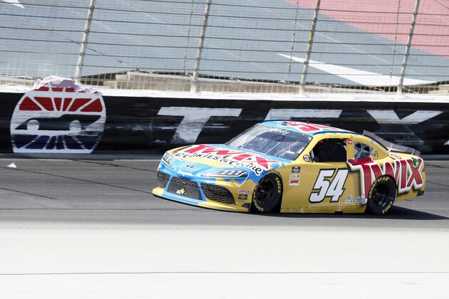 Kyle Busch heads for the front stretch during the NASCAR Xfinity auto race at Texas Motor Speedway in Fort Worth, Texas, Saturday, July 18, 2020. (AP Photo/Ray Carlin)