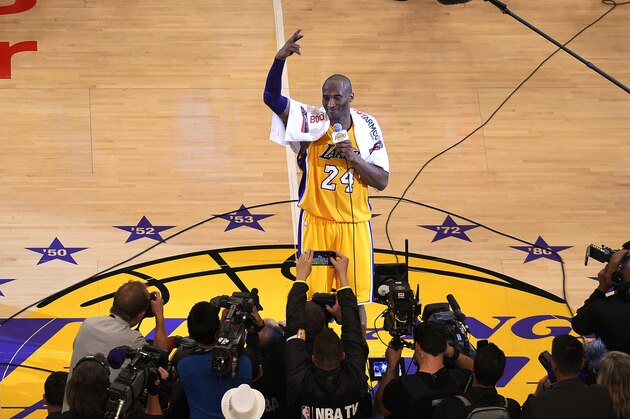Los Angeles Lakers forward Kobe Bryant speaks to fans after the Lakers' NBA basketball game against the Utah Jazz, Wednesday, April 13, 2016, in Los Angeles. Bryant scored 60 points in what he said was his final NBA game as the Lakers won 101-96. (AP Photo/Mark J. Terrill)