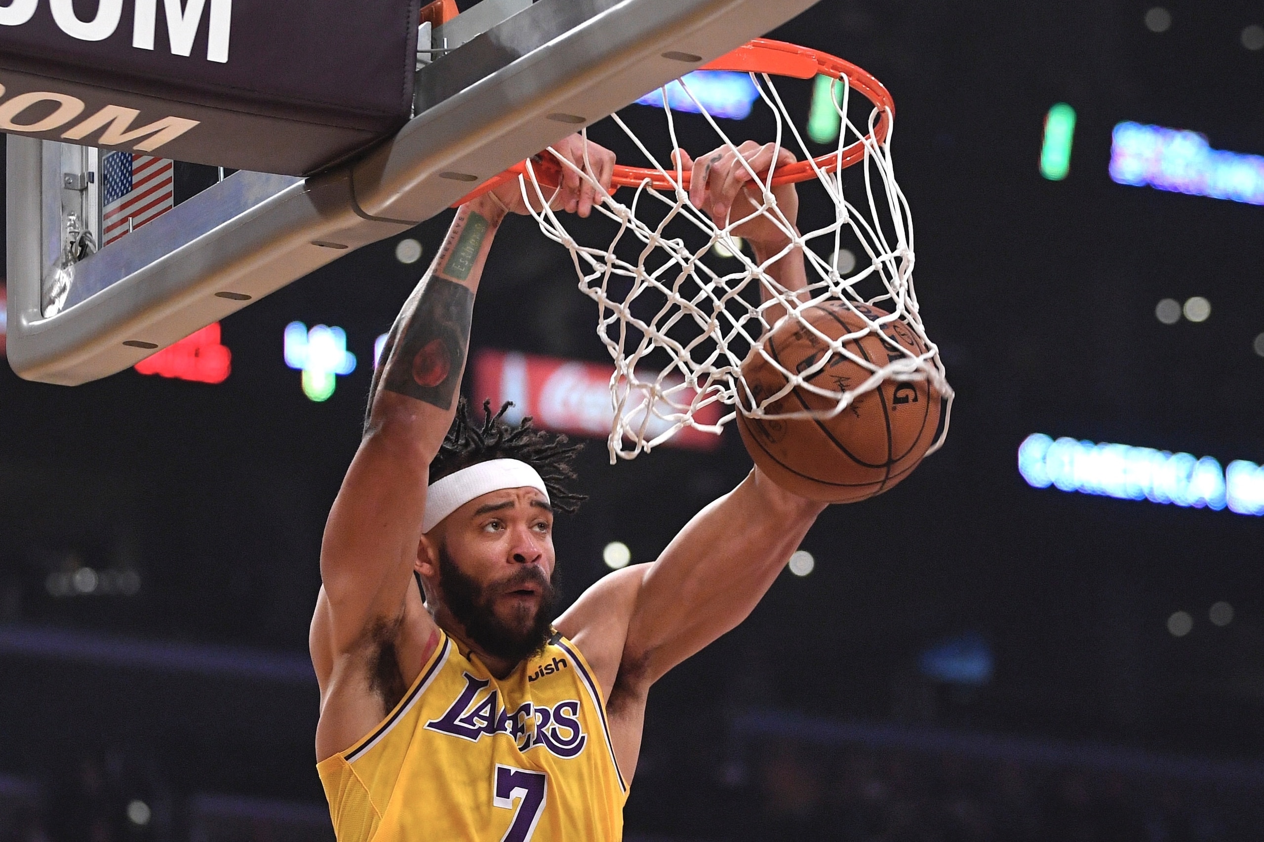 Los Angeles Lakers center JaVale McGee dunks during the first half of an NBA basketball game against the Philadelphia 76ers Tuesday, March 3, 2020, in Los Angeles. (AP Photo/Mark J. Terrill)