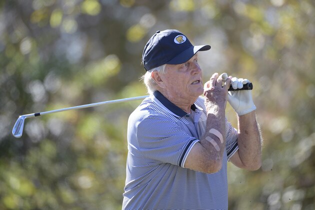 Jack Nicklaus watches his tee shot on the eighth hole during the first round of the Father Son Challenge golf tournament Saturday, Dec. 7, 2019, in Orlando, Fla. (AP Photo/Phelan M. Ebenhack)