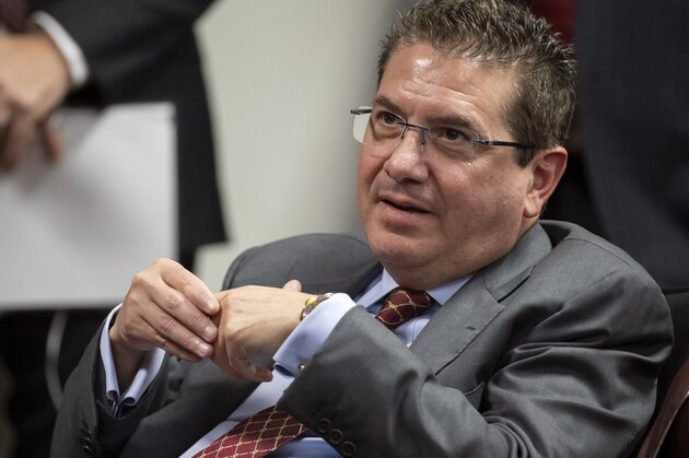 FILE - This Jan. 2, 2020, file photo shows Washington Redskins owner Dan Snyder listening to head coach Ron Rivera during a news conference at the team's NFL football training facility, in Ashburn, Va. Snyder has hired a D.C. law firm to review the Washington NFL team's culture, policies and allegations of workplace misconduct. Beth Wilkinson of Wilkinson Walsh LLP confirmed to The Associated Press that the firm had been retained to conduct an independent review. (AP Photo/Alex Brandon, File)