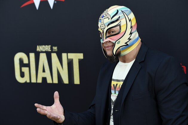 Professional wrestler Rey Mysterio poses at the premiere of the HBO documentary film Professional wrestler Rey Mysterio poses at the premiere of the HBO documentary film