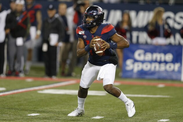 Arizona quarterback Khalil Tate drops back to pass against during the second half of the team's NCAA college football game against Utah, Saturday, Nov. 23, 2019, in Tucson, Ariz. (AP Photo/Rick Scuteri)