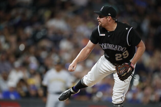 Colorado Rockies relief pitcher Bryan Shaw (29) in the sixth inning of a baseball game Saturday, Aug. 31, 2019, in Denver. (AP Photo/David Zalubowski)