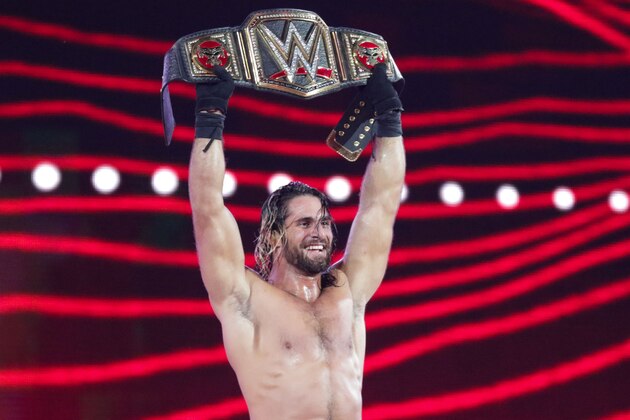 IMAGE DISTRIBUTED FOR WWE - WWE Superstar Seth Rollins celebrates becoming the new WWE World Heavyweight Champion at WrestleMania 31 at Levi's Stadium on Sunday, March 29, 2015 in Santa Clara, CA. WrestleMania broke the Levi’s Stadium attendance record at 76,976 fans from all 50 states and 40 countries. (Don Feria/AP Images for WWE)