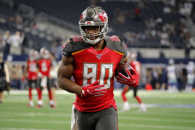 Tampa Bay Buccaneers tight end O.J. Howard (80) warms up before a preseason NFL football game against the Dallas Cowboys in Arlington, Texas, Thursday, Aug. 29, 2019. (AP Photo/Tony Gutierrez)