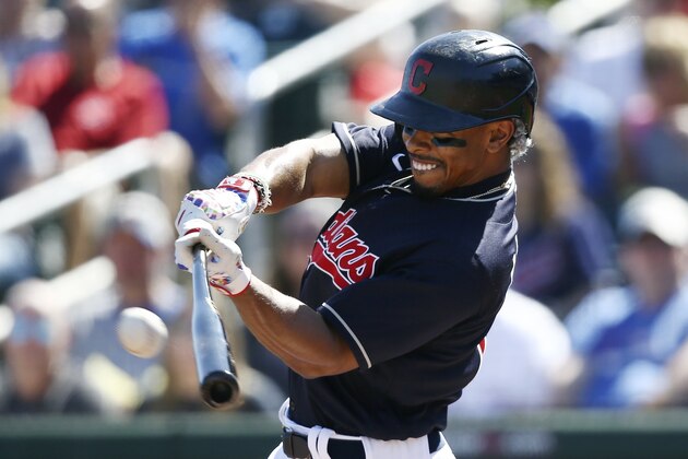 FILE - In this March 7, 2020, file photo, Cleveland Indians' Francisco Lindor connects for a home run against the Chicago Cubs during the first inning of a spring training baseball game in Goodyear, Ariz. Whether this season started in March or July, All-Star shortstop Lindor's future was going to hang over the club. The 26-year-old has grown into one of the game's best all-around players, a once-in-a-decade talent who can win games with his bat, glove or legs. (AP Photo/Ross D. Franklin, File) FILE - In this March 7, 2020, file photo, Cleveland Indians' Francisco Lindor connects for a home run against the Chicago Cubs during the first inning of a spring training baseball game in Goodyear, Ariz. Whether this season started in March or July, All-Star shortstop Lindor's future was going to hang over the club. The 26-year-old has grown into one of the game's best all-around players, a once-in-a-decade talent who can win games with his bat, glove or legs. (AP Photo/Ross D. Franklin, File)