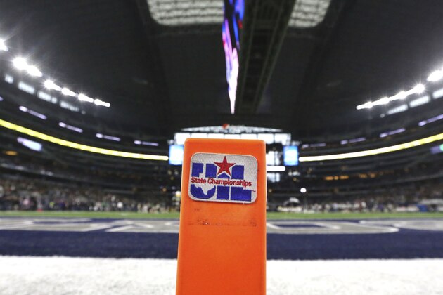 A pylon displays a sign for the UIL state football championships in the end zone in Arlington, Texas, Saturday, Dec. 17, 2016. (AP Photo/LM Otero)