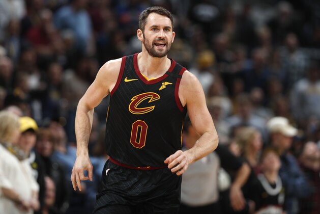 Cleveland Cavaliers forward Kevin Love heads up the court after making a 3-point basket against the Denver Nuggets during the first half of an NBA basketball game Saturday, Jan. 11, 2020, in Denver. (AP Photo/David Zalubowski)