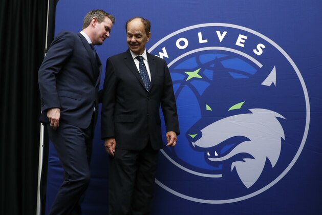 Minnesota Timberwolves CEO Ethan Casson, left, talks with Timberwolves majority owner Glen Taylor following a news conference, Tuesday, May 30, 2017, in Des Moines, Iowa. The Timberwolves, who recently purchased the Iowa Energy D-League franchise, unveiled their new affiliate's name, logo and colors. (AP Photo/Charlie Neibergall)