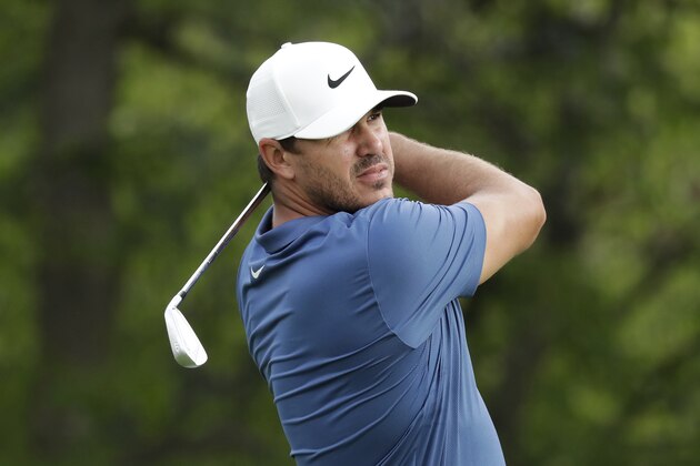 Brooks Koepka hits from the 14th tee during the second round of the Memorial golf tournament, Friday, July 17, 2020, in Dublin, Ohio. (AP Photo/Darron Cummings)