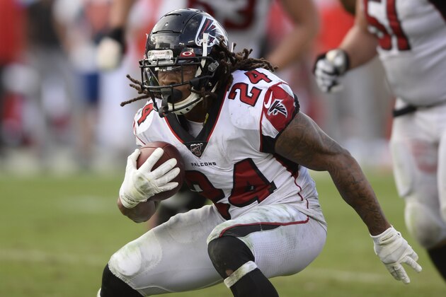 Atlanta Falcons running back Devonta Freeman (24) runs against the Tampa Bay Buccaneers during the second half of an NFL football game Sunday, Dec. 29, 2019, in Tampa, Fla. (AP Photo/Jason Behnken)
