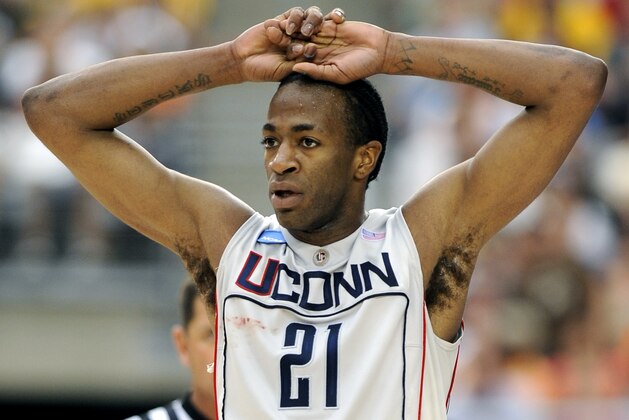 Connecticut's Stanley Robinson (21) reacts during the second half against Missouri at a men's NCAA college basketball tournament regional final in Glendale, Ariz., Saturday, March 28, 2009. (AP Photo/Mark J. Terrill)