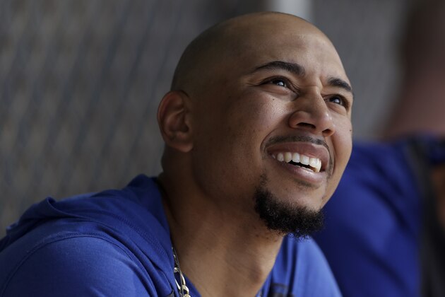 Los Angeles Dodgers right fielder Mookie Betts looks on during spring training baseball Wednesday, Feb. 19, 2020, in Phoenix. (AP Photo/Gregory Bull)