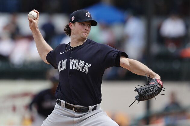 FILE - In this March 5, 2020, file photo, New York Yankees starting pitcher Gerrit Cole throws during a spring training baseball game against the Detroit Tigers in Lakeland, Fla. Due to the coronavirus pandemic, Cole still has not made his regular season debut with the Yankees. (AP Photo/Carlos Osorio, File)