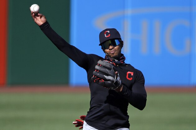 Cleveland Indians shortstop Francisco Lindor warms up before an exhibition baseball game against the Pittsburgh Pirates in Pittsburgh, Saturday, July 18, 2020. (AP Photo/Gene J. Puskar)