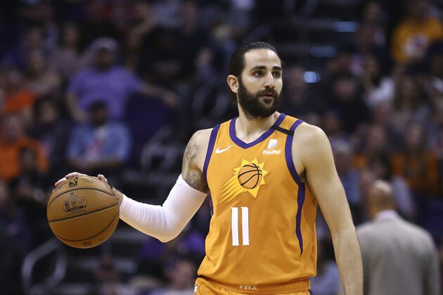 Phoenix Suns guard Ricky Rubio dribbles the ball against the Portland Trail Blazers during the second half of an NBA basketball game Friday, March 6, 2020, in Phoenix. The Suns defeated the Trail Blazers 127-117. (AP Photo/Ross D. Franklin)