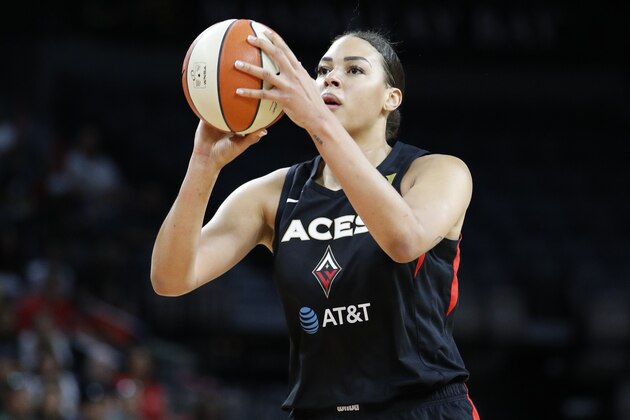 Las Vegas Aces' Liz Cambage (8) plays against the Washington Mystics during the first half of Game 4 of a WNBA playoff basketball series Tuesday, Sept. 24, 2019, in Las Vegas. (AP Photo/John Locher)