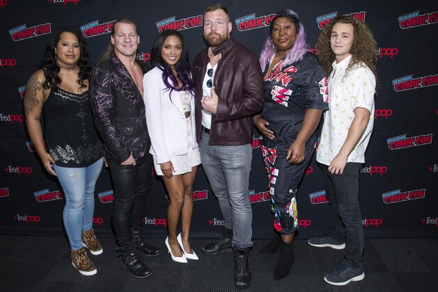 Nyla Rose, from left, Chris Jericho, Brandi Rhodes, Jon Moxley, Awesome Kong and Jungle Boy attend New York Comic Con to promote TNT's