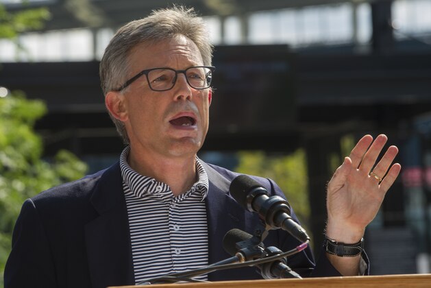 Cleveland Indians President Paul Dolan speaks at the unveiling of a statue honoring Indians Hall of Fame coach and player Lou Boudreau, before the Indians' baseball game against the New York Yankees in Cleveland, Saturday, Aug. 5, 2017. (AP Photo/Phil Long)