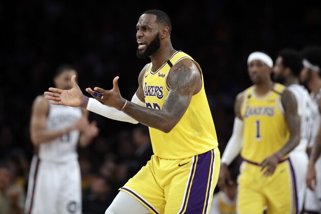 Los Angeles Lakers' LeBron James argues a call during the second half of an NBA basketball game against the Brooklyn Nets Tuesday, March 10, 2020, in Los Angeles. (AP Photo/Marcio Jose Sanchez) Los Angeles Lakers' LeBron James argues a call during the second half of an NBA basketball game against the Brooklyn Nets Tuesday, March 10, 2020, in Los Angeles. (AP Photo/Marcio Jose Sanchez)