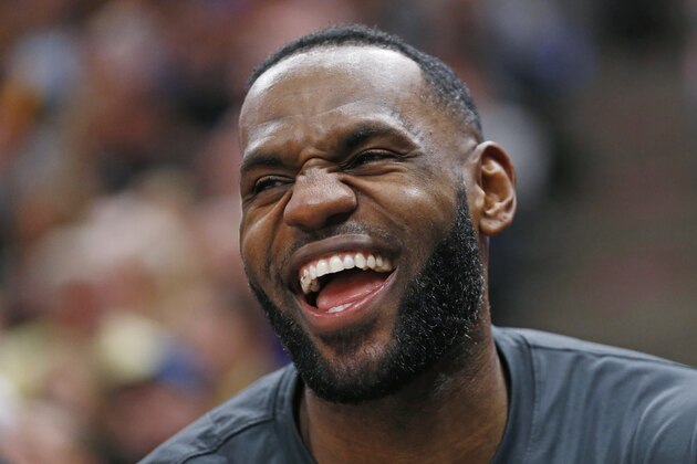 Los Angeles Lakers forward LeBron James (23) laughs as he sits on the bench in the first half during an NBA basketball game against the Utah Jazz Wednesday, Dec. 4, 2019, in Salt Lake City. (AP Photo/Rick Bowmer) Los Angeles Lakers forward LeBron James (23) laughs as he sits on the bench in the first half during an NBA basketball game against the Utah Jazz Wednesday, Dec. 4, 2019, in Salt Lake City. (AP Photo/Rick Bowmer)
