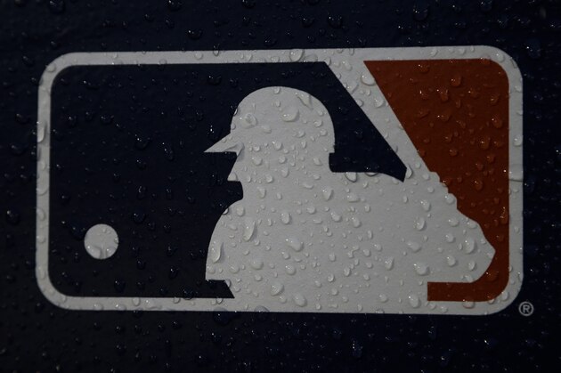 A rain-covered logo is seen at Fenway Park before Game 1 of the World Series baseball game between the Boston Red Sox and the Los Angeles Dodgers Tuesday, Oct. 23, 2018, in Boston. (AP Photo/Matt Slocum) A rain-covered logo is seen at Fenway Park before Game 1 of the World Series baseball game between the Boston Red Sox and the Los Angeles Dodgers Tuesday, Oct. 23, 2018, in Boston. (AP Photo/Matt Slocum)