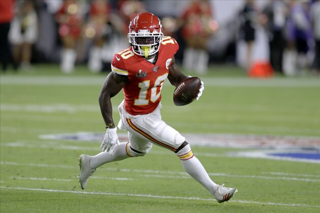 Kansas City Chiefs' Tyreek Hill runs against the San Francisco 49ers during the first half of the NFL Super Bowl 54 football game Sunday, Feb. 2, 2020, in Miami Gardens, Fla. (AP Photo/Chris O'Meara)
