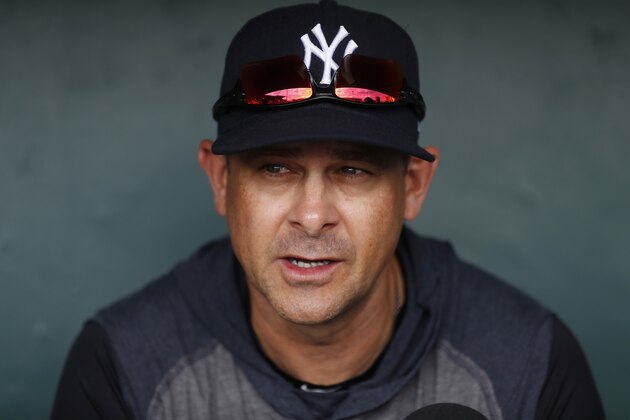 New York Yankees manager Aaron Boone is interviewed before a spring training baseball game against the Detroit Tigers, Thursday, March 5, 2020, in Lakeland, Fla. (AP Photo/Carlos Osorio)