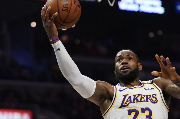 Los Angeles Lakers forward LeBron James shoots during the second half of an NBA basketball game against the Los Angeles Clippers Sunday, March 8, 2020, in Los Angeles. The Lakers won 112-103. (AP Photo/Mark J. Terrill) Los Angeles Lakers forward LeBron James shoots during the second half of an NBA basketball game against the Los Angeles Clippers Sunday, March 8, 2020, in Los Angeles. The Lakers won 112-103. (AP Photo/Mark J. Terrill)