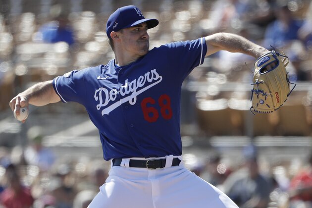 Los Angeles Dodgers starting pitcher Ross Stripling works against a Chicago White Sox batter during the first inning of a spring training baseball game Monday, Feb. 24, 2020, in Glendale, Ariz. (AP Photo/Gregory Bull)