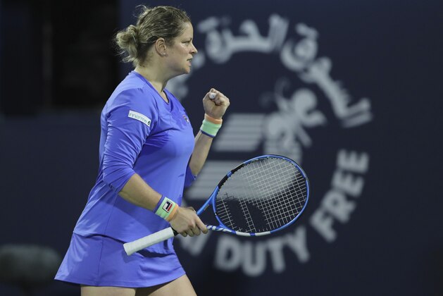 Belgium's Kim Clijsters reacts after she got a point against Spain's Gabrine Muguruza during a match of the Dubai Duty Free Tennis Championship in Dubai, United Arab Emirates, Monday, Feb. 17, 2020. (AP Photo/Kamran Jebreili)