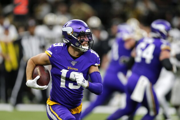 Minnesota Vikings wide receiver Adam Thielen (19) carries in the first half of an NFL wild-card playoff football game against the New Orleans Saints, Sunday, Jan. 5, 2020, in New Orleans. (AP Photo/Brett Duke)