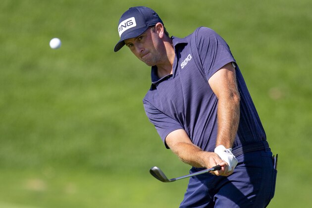 Michael Thompson chips on the 9th hole of the during the first round of the 3M Open golf tournament in Blaine, Minn., Thursday, July 23, 2020. (AP Photo/Andy Clayton- King)