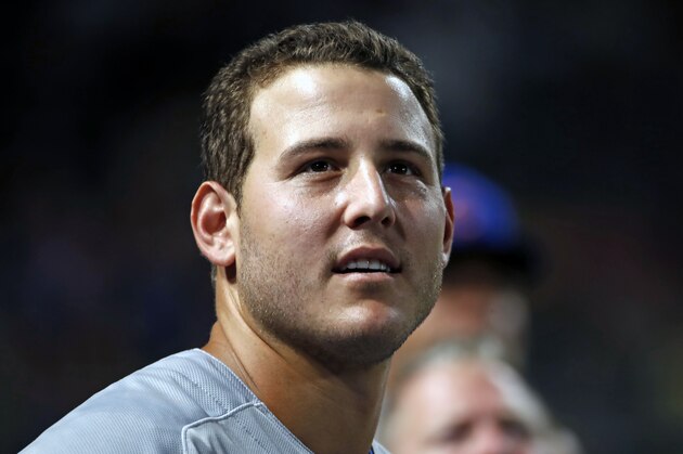 Chicago Cubs' Anthony Rizzo stands in the dugout during a baseball game Pittsburgh Pirates in Pittsburgh, Monday, July 1, 2019. (AP Photo/Gene J. Puskar)