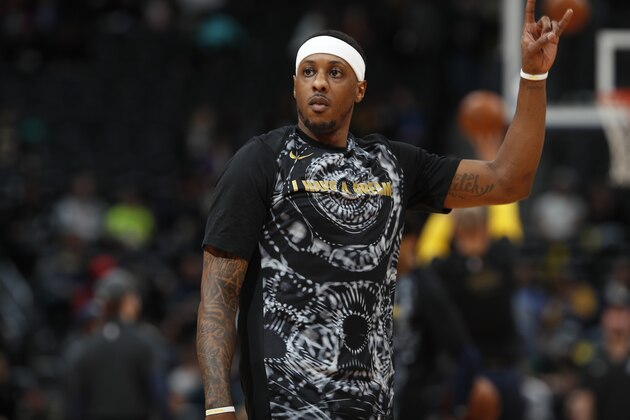 Memphis Grizzlies guard Mario Chalmers (6) in the first half of an NBA basketball game Friday, Jan. 12, 2018, in Denver. (AP Photo/David Zalubowski)