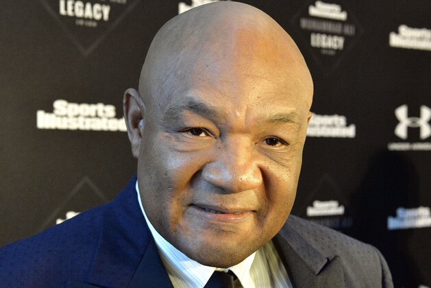 Former boxing heavyweight champion George Foreman speaks to the media on the red carpet of the Sports Illustrated Legacy Awards Thursday, Oct. 1, 2015, in Louisville, Ky. Sports Illustrated announced that it will dedicate the franchise's Sportsman Legacy Award in the name of boxing legend Muhammad Ali. (AP Photo/Timothy D. Easley)