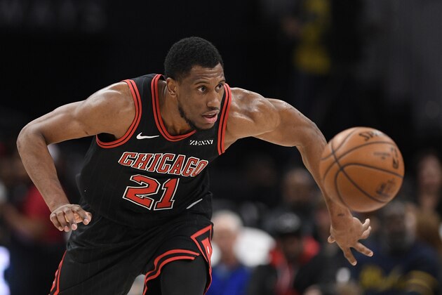 Chicago Bulls forward Thaddeus Young (21) chases the ball during the first half of an NBA basketball game against the Washington Wizards, Wednesday, Dec. 18, 2019, in Washington. (AP Photo/Nick Wass)