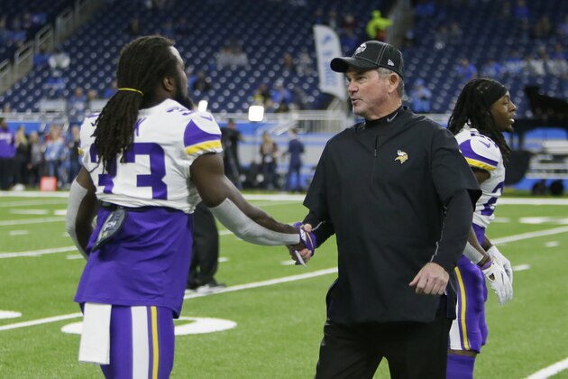 Minnesota Vikings head coach Mike Zimmer meets with running back Dalvin Cook (33) during pregame of an NFL football game against the Detroit Lions, Sunday, Oct. 20, 2019, in Detroit. (AP Photo/Duane Burleson) Minnesota Vikings head coach Mike Zimmer meets with running back Dalvin Cook (33) during pregame of an NFL football game against the Detroit Lions, Sunday, Oct. 20, 2019, in Detroit. (AP Photo/Duane Burleson)