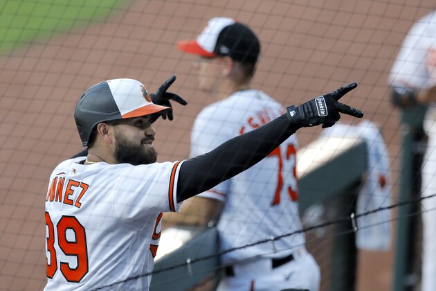 Baltimore Orioles' Renato Nunez pretends to acknowledge fans after hitting a home run during an inter-squad scrimmage at baseball training camp, Wednesday, July 8, 2020, in Baltimore. (AP Photo/Julio Cortez) Baltimore Orioles' Renato Nunez pretends to acknowledge fans after hitting a home run during an inter-squad scrimmage at baseball training camp, Wednesday, July 8, 2020, in Baltimore. (AP Photo/Julio Cortez)