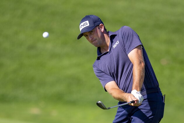 Michael Thompson chips on the 9th hole of the during the first round of the 3M Open golf tournament in Blaine, Minn., Thursday, July 23, 2020. (AP Photo/Andy Clayton- King)