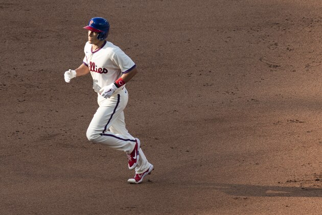 Philadelphia Phillies' J.T. Realmuto rounds the bases after hitting a three-run home run during the seventh inning of a baseball game against the Miami Marlins, Saturday, July 25, 2020, in Philadelphia. (AP Photo/Chris Szagola)