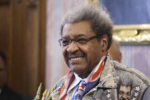 Boxing promotor Don King is shown during a news-conference Tuesday, Feb. 11, 2014, in Cleveland. (AP Photo/Tony Dejak)