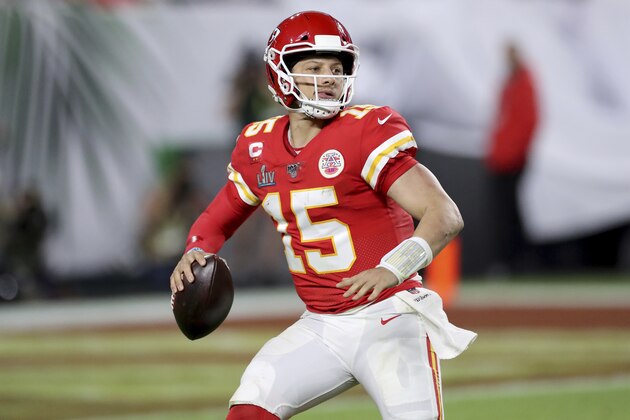Kansas City Chiefs quarterback Patrick Mahomes (15) scrambles against the San Francisco 49ers at Super Bowl 54 on Feb. 2, 2020, in Miami Gardens, Fla. The Chiefs won the game 31-20. (AP Photo/Gregory Payan)
