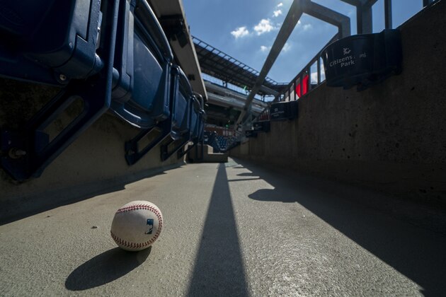 A foul ball that was hit into the stands sits on the ground of an empty stadium during the eight inning of a baseball game between the Miami Marlins and the Philadelphia Phillies, Sunday, July 26, 2020, in Philadelphia. The Marlins won 11-6. (AP Photo/Chris Szagola) A foul ball that was hit into the stands sits on the ground of an empty stadium during the eight inning of a baseball game between the Miami Marlins and the Philadelphia Phillies, Sunday, July 26, 2020, in Philadelphia. The Marlins won 11-6. (AP Photo/Chris Szagola)