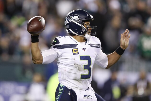Seattle Seahawks quarterback Russell Wilson throws a pass against the Philadelphia Eagles during the first half of an NFL wild-card playoff football game, Sunday, Jan. 5, 2020, in Philadelphia. The Seahawks won 17-9. (AP Photo/Julio Cortez)
