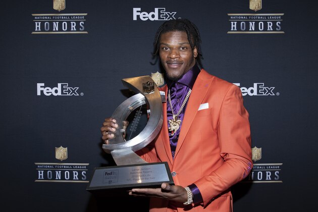 IMAGE DISTRIBUTED FOR FEDEX - Lamar Jackson, of the Baltimore Ravens, accepts the 2019 FedEx Air Player of the Year award at the NFL Honors at the Adrienne Arsht Center on Saturday, Feb. 1, 2020 in Miami. FedEx donated $20,000 in his name to the USO. FedEx is the Official Delivery Service Sponsor of the NFL. (Omar Vega/AP Images for FedEx) IMAGE DISTRIBUTED FOR FEDEX - Lamar Jackson, of the Baltimore Ravens, accepts the 2019 FedEx Air Player of the Year award at the NFL Honors at the Adrienne Arsht Center on Saturday, Feb. 1, 2020 in Miami. FedEx donated $20,000 in his name to the USO. FedEx is the Official Delivery Service Sponsor of the NFL. (Omar Vega/AP Images for FedEx)