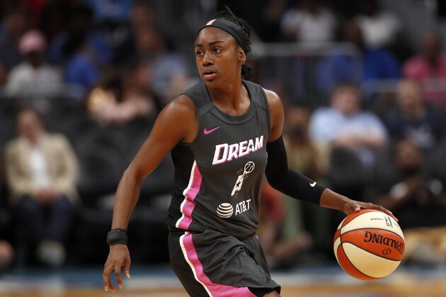 Atlanta Dream guard Tiffany Hayes (15) looks to pass in the first half of a WNBA basketball game against the Chicago Sky Tuesday, Aug. 20, 2019, in Atlanta. (AP Photo/John Bazemore)