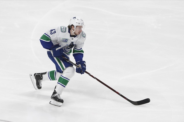 Vancouver Canucks' Quinn Hughes skates against the Minnesota Wild in an NHL hockey game Thursday, Feb. 6, 2020, in St. Paul, Minn. (AP Photo/Jim Mone)